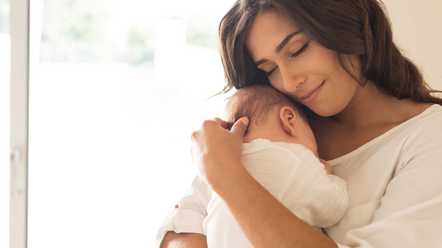 Mum enjoying special moments with baby and holding onto the memories