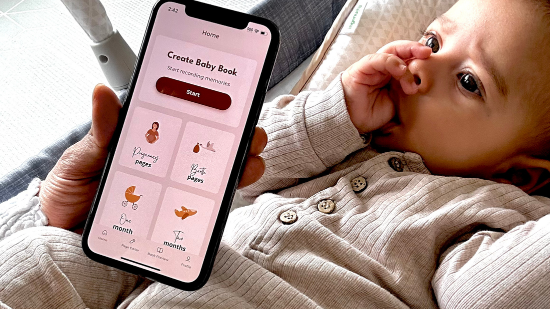 Mum using baby book app with baby in background