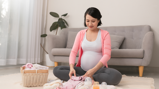 pregnant lady packing baby bag