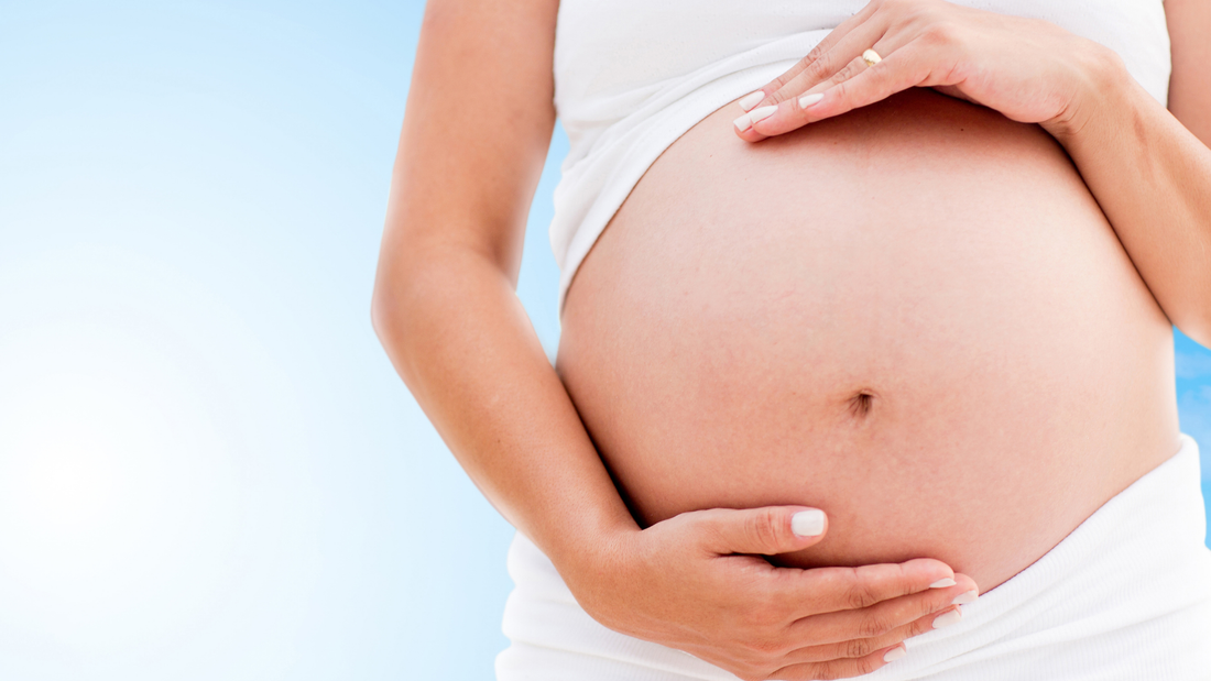 pregnant lady holding belly