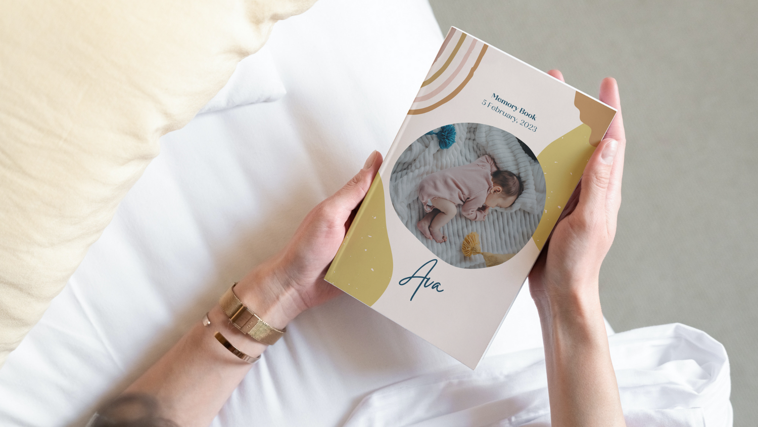 lady holding Ava's memory book in hands