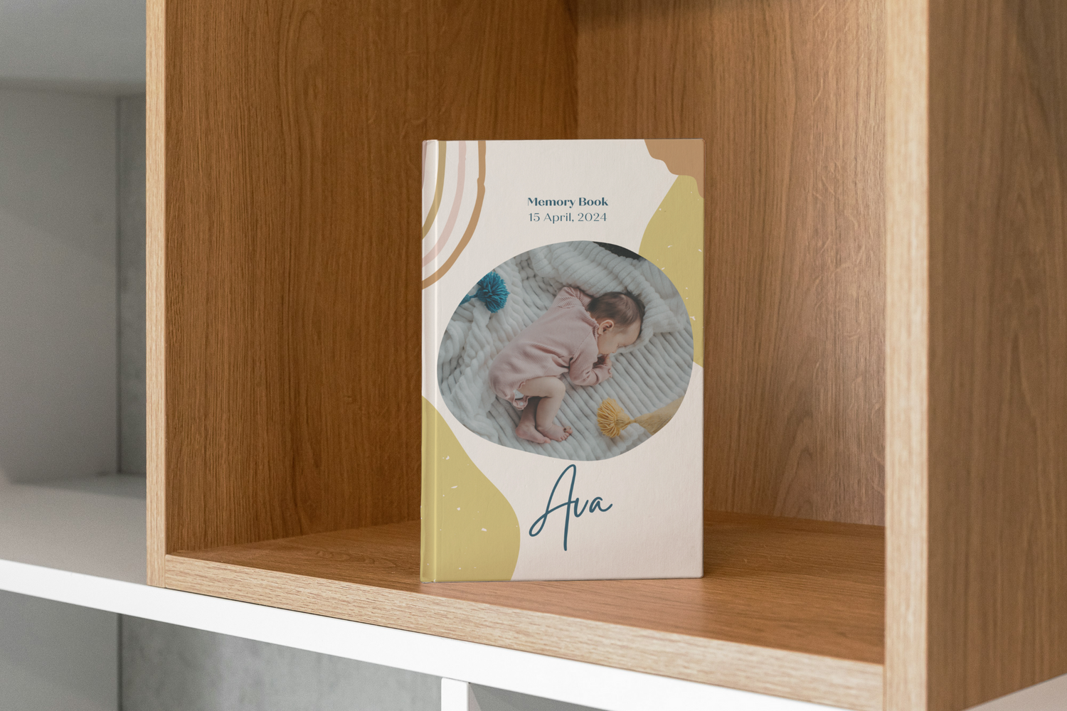 baby memory book sitting on shelf
